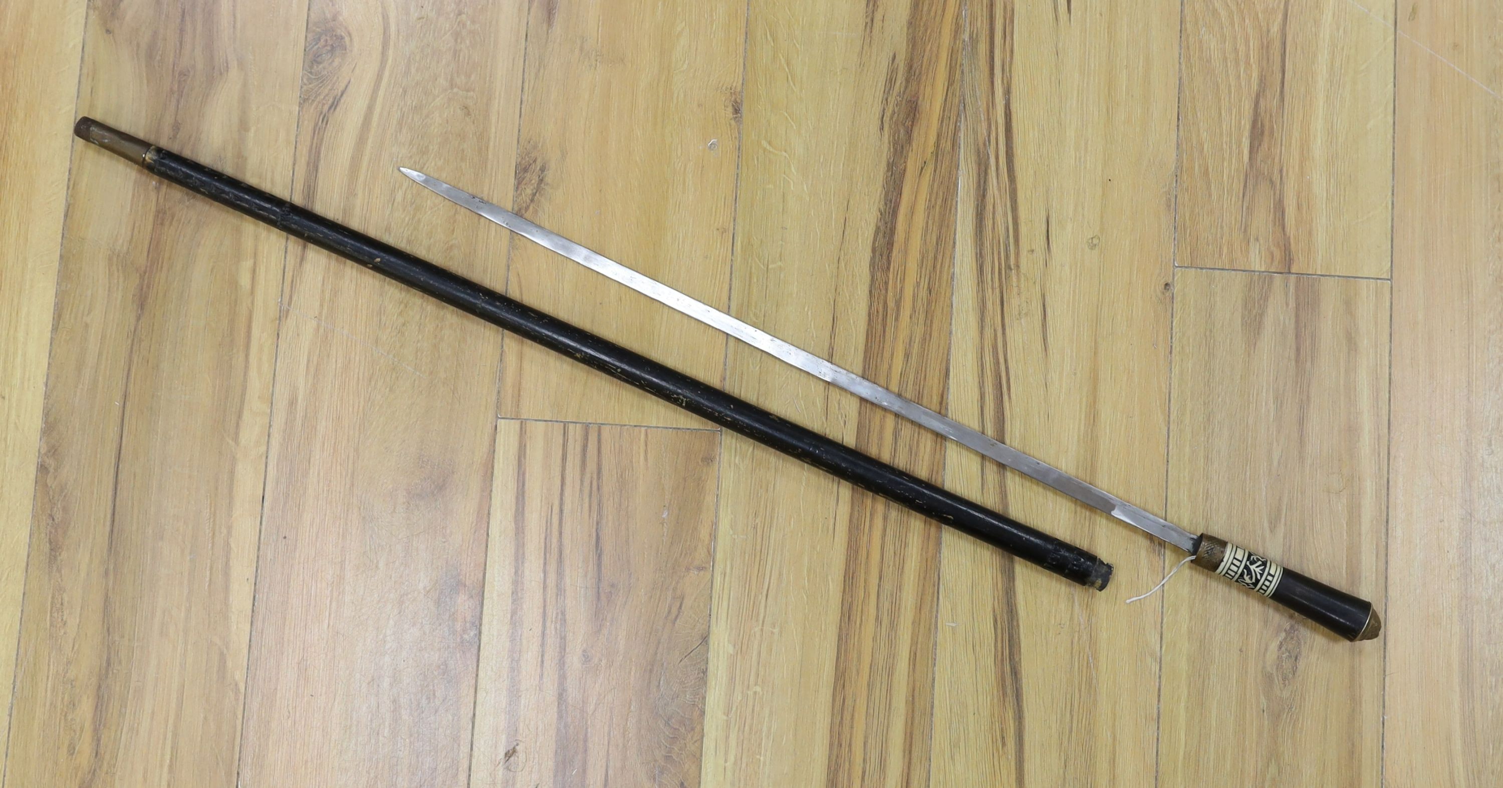 A bone and lacquered wood sword stick - 92cm tall